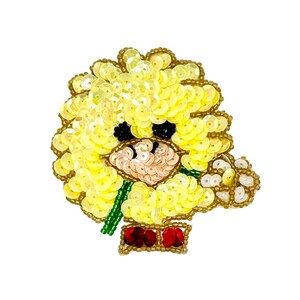May include: A handcrafted beaded patch featuring a yellow sequined character with a large, fluffy yellow head, black eyes, and a light pink face. The figure holds a green beaded stem and wears a red sequined base, all outlined in gold beads.