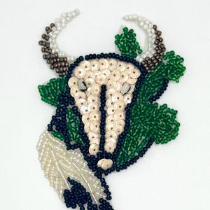Steer Skull with Feathers and Cactus 3.5" x 2.5
