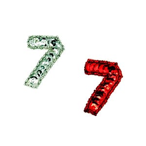 May include: Two decorative number seven embellishments. One is silver with sequins, the other is red with black accents. Both are on a white background.