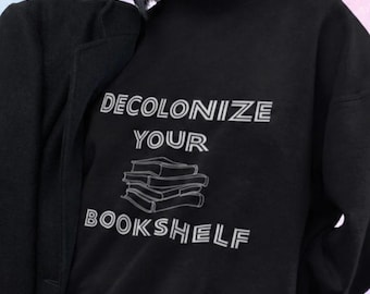 Descoloniza tu estantería, sudadera feminista, justicia social, corte unisex
