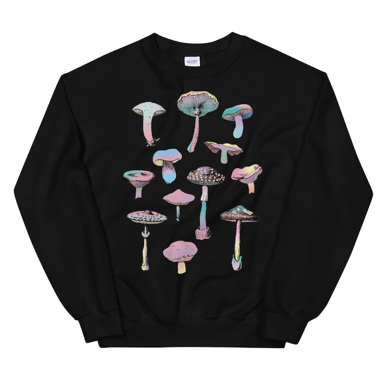 May include: Black sweatshirt with a colorful mushroom graphic print. The mushrooms are arranged in a vertical pattern and are outlined in black. The sweatshirt has long sleeves and a crew neck.
