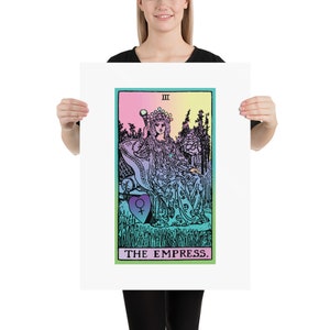 May include: A poster featuring a tarot card illustration of The Empress. The artwork depicts a regal figure seated on a throne, holding a scepter, with a colorful background. The text "THE EMPRESS" is at the bottom.