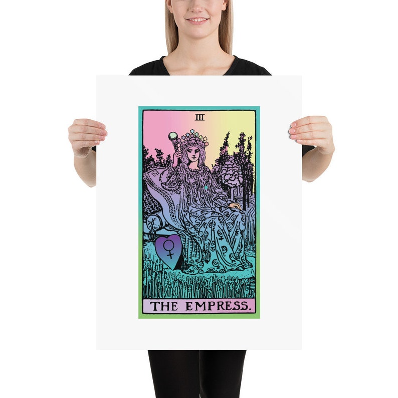 May include: A poster featuring a tarot card illustration of The Empress. The artwork depicts a regal figure seated on a throne, holding a scepter, with a colorful background. The text "THE EMPRESS" is at the bottom.