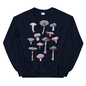 May include: A navy blue sweatshirt with a colorful mushroom graphic. The mushrooms are drawn in a vintage style and are arranged in a random pattern.
