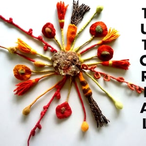 May include: A colorful felt art piece with a variety of shapes and textures. The piece is made up of red, orange, yellow, and brown felt. The word "TUTORIAL" is written in black letters on the right side of the image.