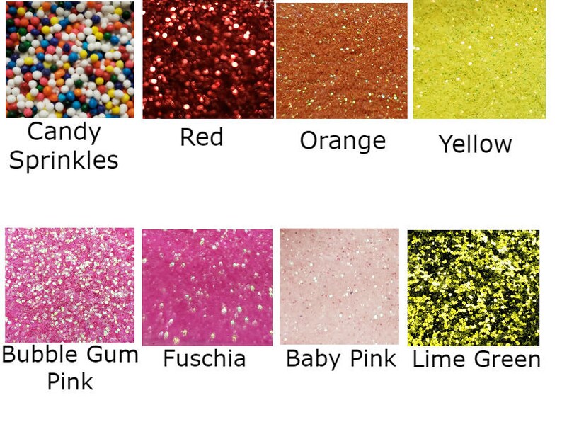 May include: A collection of colorful sprinkles and glitter in various colors, including red, orange, yellow, pink, fuchsia, baby pink, and lime green. Each color is labeled with its name.