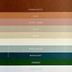 May include: A color palette featuring various shades of brown, pink, blue, and green. The colors are labeled with text, including "Terracotta," "Clay," "Dusty Rose," "Sand," "Bone," "Cotton," "Water Blue," "Midnight," "Forest," and "Faux Bois."