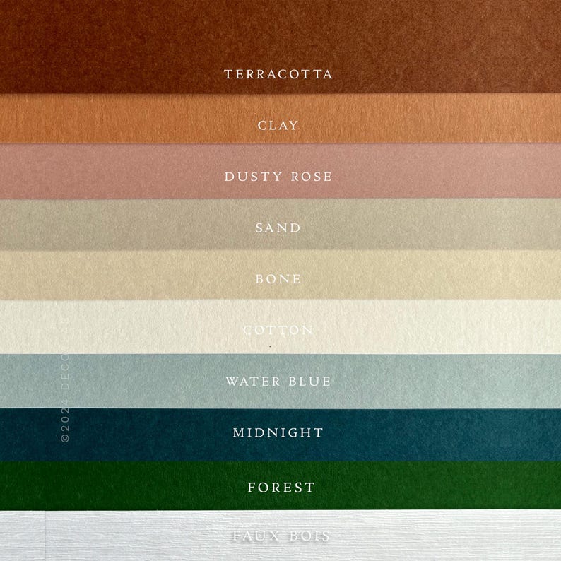 May include: A color palette featuring various shades of brown, pink, blue, and green. The colors are labeled with text, including "Terracotta," "Clay," "Dusty Rose," "Sand," "Bone," "Cotton," "Water Blue," "Midnight," "Forest," and "Faux Bois."