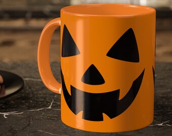 Halloweenmok met spookachtig pompoengezicht - handgemaakte keramische drinkgerei | cadeaus onder de 10| cadeaus onder de 10