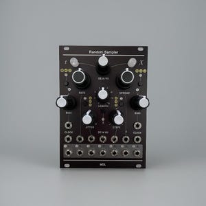 May include: Black electronic music synthesizer module with white knobs and the text "Random Sampler." Features include "Rate," "Spread," "Length," and "Bias" controls. Includes multiple input jacks and the text "MDL."