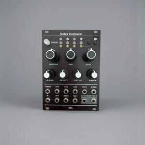 May include: A black Texture Synthesizer module with multiple knobs, buttons, and input/output jacks. The module has text labels including "FREEZE", "POSITION", "SIZE", "PITCH", "IN GAIN", "DENSITY", "TEXTURE", and "BLEND". The module is designed for audio processing.