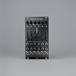 May include: Black modular synthesizer module with knobs, sliders, and input/output jacks. The text "Segment Generator" is printed at the top. The module has multiple controls for shape, time, and level.