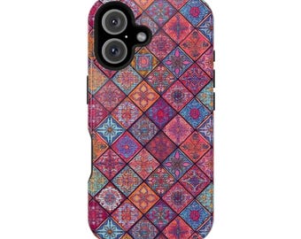 May include: A colorful phone case with a geometric pattern of squares and diamonds in shades of pink, red, blue, and orange.