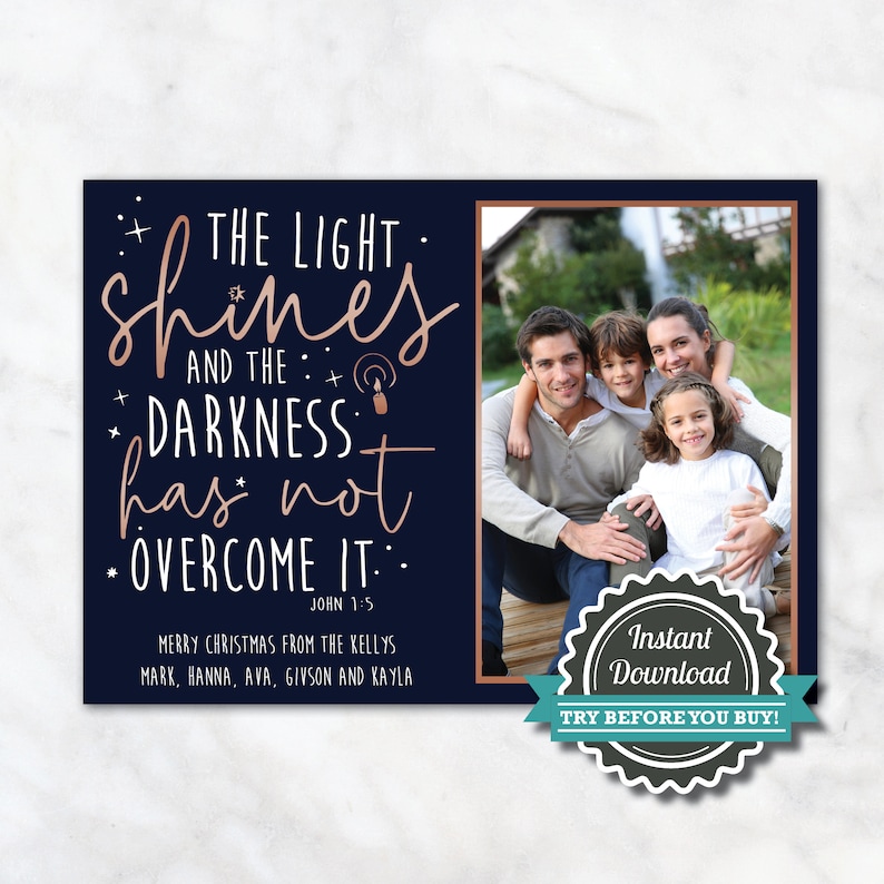 May include: A navy blue Christmas card with a family photo and text in rose gold. The text reads "The light shines and the darkness has not overcome it." The card also includes the family's names and the phrase "Instant Download."