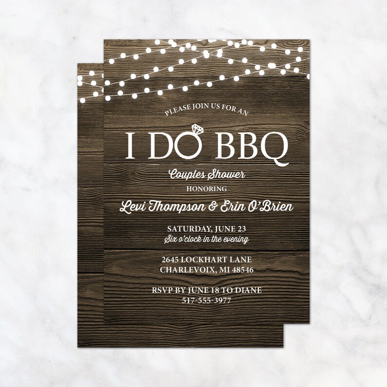 May include: Rustic woodgrain background with white string lights and the text "I DO BBQ Couples Shower Honoring Levi Thompson & Erin O'Brien Saturday, June 23 Six o'clock in the evening 2645 Lockhart Lane Charlevoix, MI 48546 RSVP by June 18 to Diane 517-555-3977"