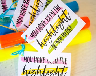May include: Four colorful highlighters with a tag attached to the top one that reads "You have been the highlight of my year!" The tag has pink, green, and yellow stripes.
