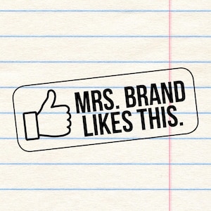 May include: A black and white graphic featuring a thumbs-up icon and the words "MRS. BRAND LIKES THIS." The design is set on a lined paper background, resembling a note or message.