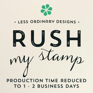 May include: Cream-colored background with the text "LESS ORDINARY DESIGNS" and "RUSH my stamp" in black. Below, it reads "PRODUCTION TIME REDUCED TO 1 - 2 BUSINESS DAYS." A green four-leaf clover design is at the top.