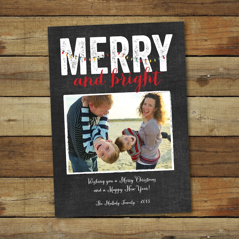 May include: A holiday card with a black background and the words "MERRY and bright" in white and red. A family photo is in the center. The card includes the text "Wishing you a Merry Christmas and a Happy New Year!" and "The Mullaly Family - 2013".