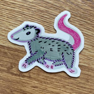 Sticker heure de l'opossum