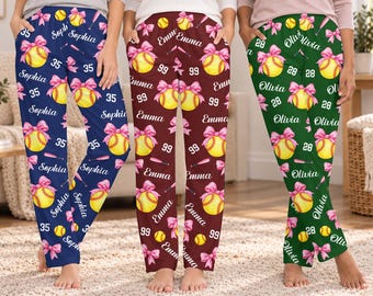 名入れソフトボール用ラウンジパンツ、カスタムネーム＆ナンバー、ピンクのリボンデザイン