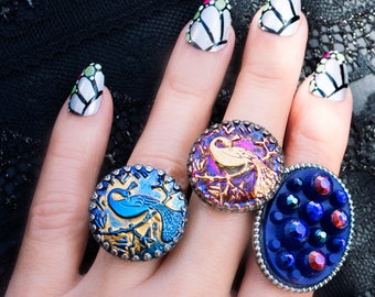 peacock bird ring in metallic blue and gold glass button