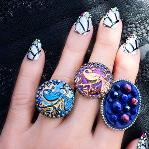peacock bird ring in metallic blue and gold glass button