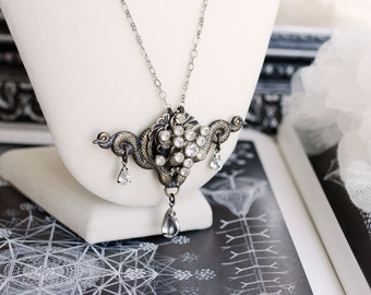 SALE - sea serpents necklace with vintage crystal centerpiece snakes