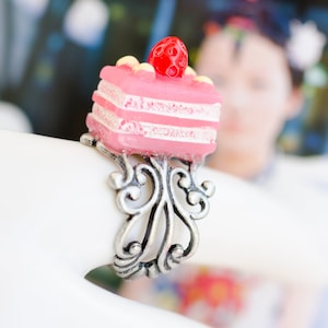 pink icing strawberry cake ring. cute deco sweets confection.