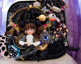 doll assemblage art. cat eye nebula by elfmadchen. one-of-a-kind original art.