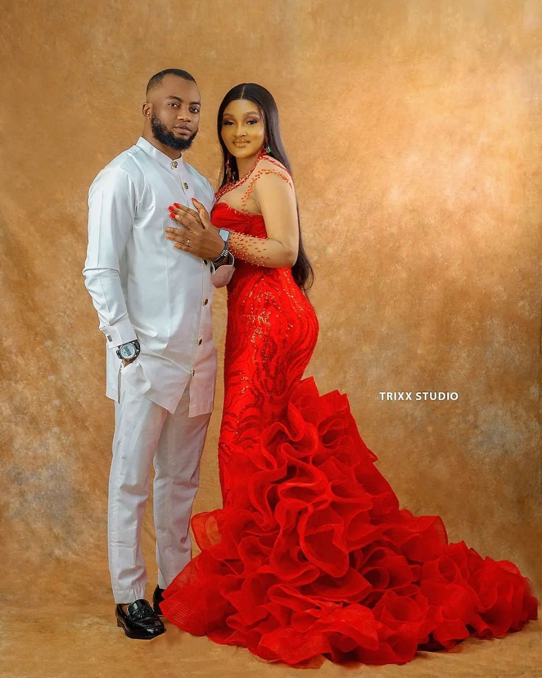 couple in red dress Modern, Alternative Couple with Red Dress and Brown Suit