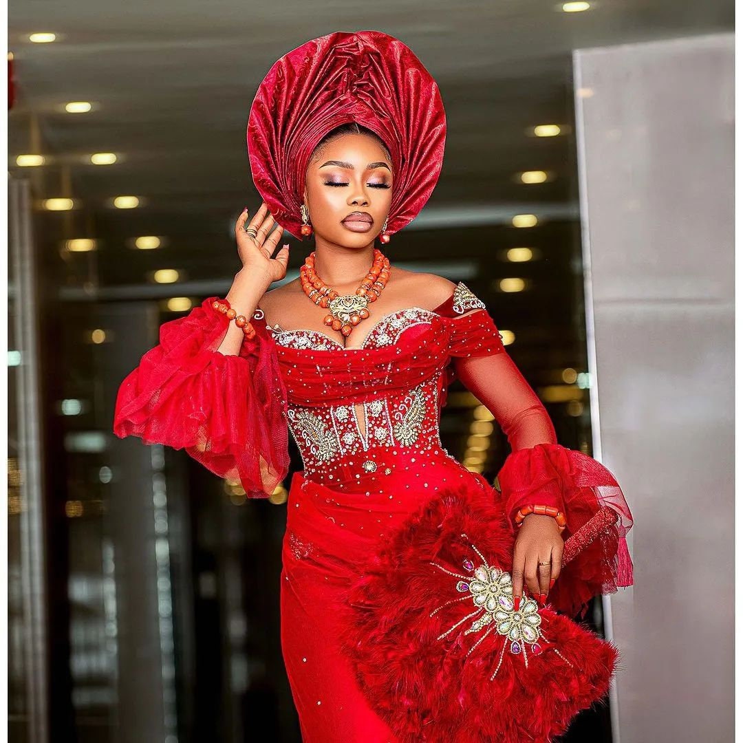red nigerian wedding dress Kascha and Henry's Vibrant Red Nigerian Wedding