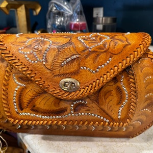 Authentic Vintage Mexican tooled leather purse from the 1960s.