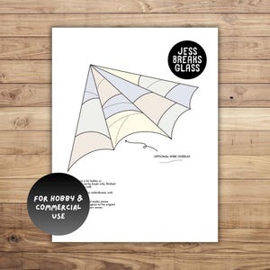May include: A white sheet featuring a geometric design in pastel shades, labelled "Jess Breaks Glass." The design includes a segmented shape with the text "Optional Wire Overlay." The text "For Hobby & Commercial Use" is also present.