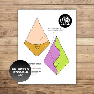 Puede incluir: Un papel blanco con dos diseños en forma de diamante coloridos, uno en melocotón y dorado, el otro en morado y verde, con detalles en espiral. El texto incluye "JESS BREAKS GLASS" y "FOR HOBBY & COMMERCIAL USE."