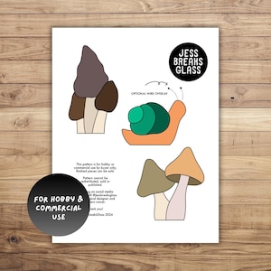 May include: A digital download pattern for creating a mushroom and snail stained glass project. The pattern includes instructions for optional wire overlay. The text "JESS BREAKS GLASS" is at the top of the page. The text "FOR HOBBY & COMMERCIAL USE" is in a circle at the bottom of the page.