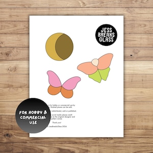 May include: A white sheet with illustrations of a crescent moon and two butterflies in pink, orange, and green. The sheet also features the text "JESS BREAKS GLASS" and "FOR HOBBY & COMMERCIAL USE".