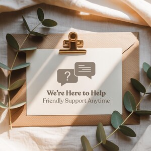 May include: A white card with the text "We're Here to Help Friendly Support Anytime" is held by a gold clip on a brown envelope. Two gray speech bubbles with a question mark and lines are in the center. Green leaves are in the corners.