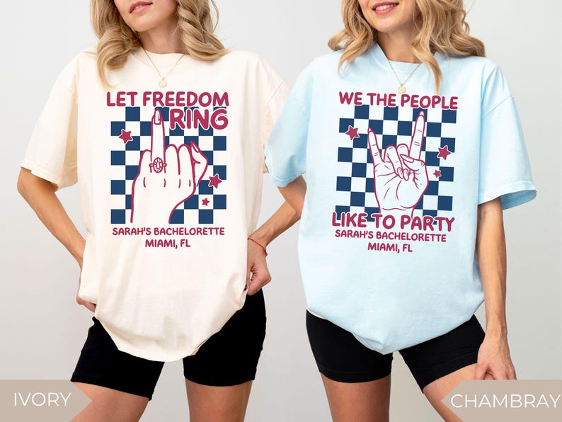 May include: Two oversized t-shirts, one ivory and one chambray blue, feature graphic designs. The ivory shirt says "LET FREEDOM RING" with a hand gesture and stars. The blue shirt says "WE THE PEOPLE LIKE TO PARTY". Both shirts are for Sarah's Bachelorette in Miami, FL.