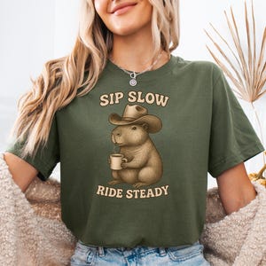 Sip Slow Ride Steady Shirt, Coffee Capybara Shirt, Capybara Shirt, Rodent Shirts, Cowboy Capybara Shirts, Vintage Western Theme Graphic Tee