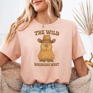Chemise The Wild Whiskers West, chemise capybara, chemises rongeurs, chemises de cow-boy, chemise capybara western, t-shirt graphique thème dessin animé western