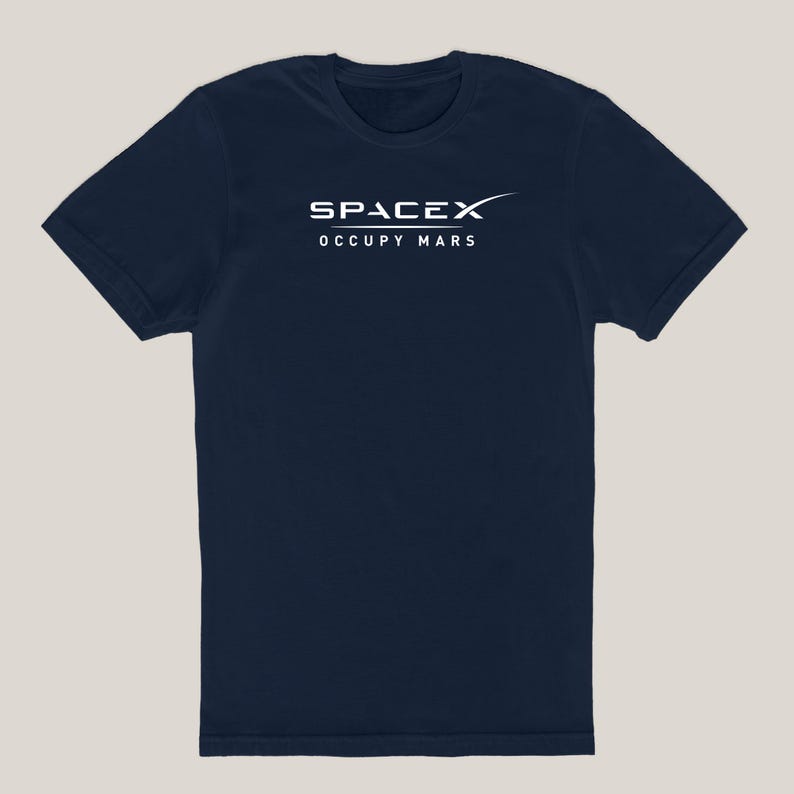 May include: A navy blue t-shirt with the SpaceX logo and the text "Occupy Mars" in white.