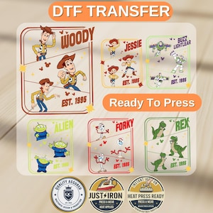 May include: A DTF transfer sheet featuring Toy Story characters including Woody, Jessie, Buzz Lightyear, Alien, Forky, and Rex. Each character section includes the name, the text EST. 1995, and small star icons. The sheet includes three circular quality assurance badges at the bottom.