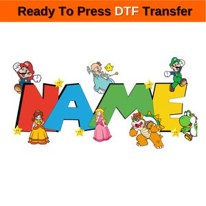 Może przedstawiać: Kolorowy wzór transferu DTF z napisem "NAME" w dużych, blokowych literach. Litery są czerwone, niebieskie, zielone i żółte, z postaciami z kreskówek z popularnej serii gier wideo otaczającymi je. Tekst "Ready To Press DTF Transfer" znajduje się na górze.