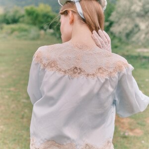 50’s Baby Blue Ruffles and Rose Trim Bed Jacket by Laros main image 0
