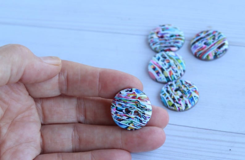 A set of 5 polymer clay buttons
