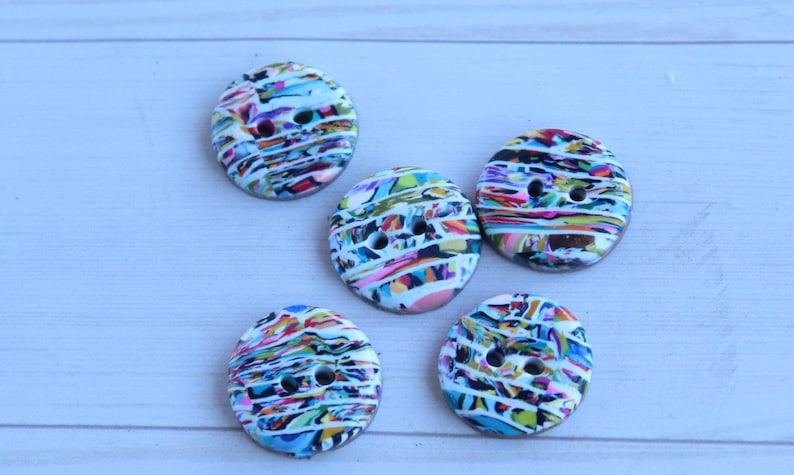 A set of 5 polymer clay buttons