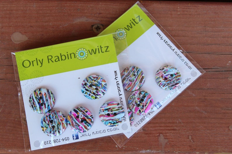 A set of 5 polymer clay buttons