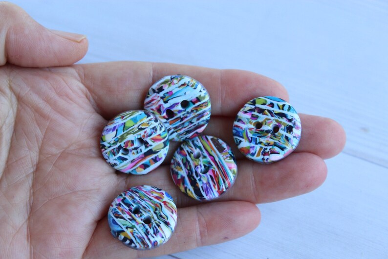 A set of 5 polymer clay buttons