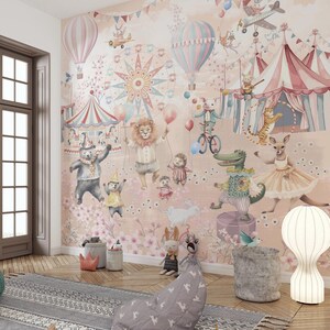 May include: A children's room with a circus-themed mural depicting animated animals, hot air balloons, and a carousel. The room includes a green ottoman, a grey rug, and a beanbag chair, creating a playful and inviting atmosphere.